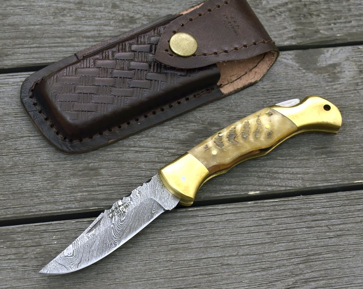 http://www.shokuninusa.com/cdn/shop/products/tranquility-pocket-knife-with-ram-horn-handle-835233.jpg?v=1702004422